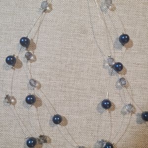 Blue beaded floating necklace and earrings